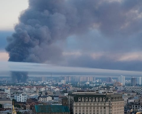 Smoke rises over Kyiv after a Russian drone and missile attack, July 2, 2026