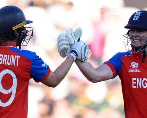 Nat Sciver-Brunt and Heather Knight celebrate during their record 133-run partnership in the Women's T20 World Cup semifinal at The Oval