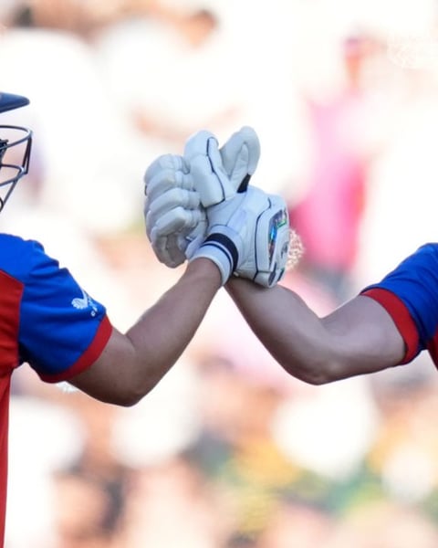 Nat Sciver-Brunt and Heather Knight celebrate during their record 133-run partnership in the Women's T20 World Cup semifinal at The Oval
