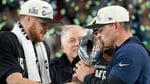 Seattle Seahawks players on the field representing the franchise sold to Vinod Khosla for a record 9.6 billion dollars
