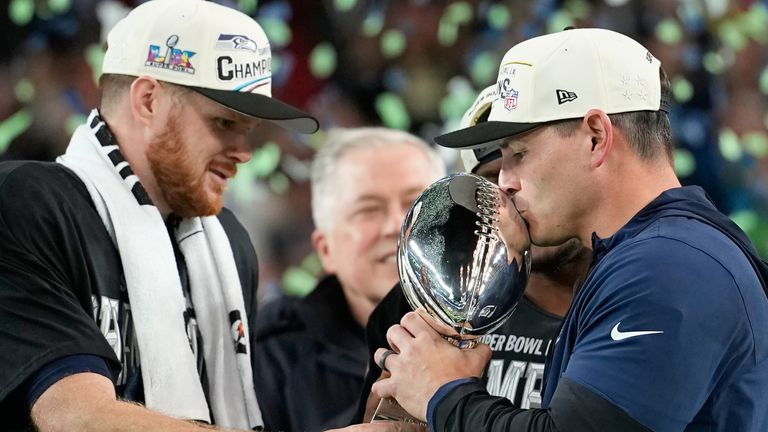 Seattle Seahawks players on the field representing the franchise sold to Vinod Khosla for a record 9.6 billion dollars