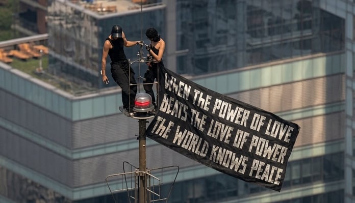 Angela Nikolau and Ivan Beerkus, Netflix Skywalkers documentary stars, at the Empire State Building July 2026