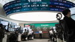 South Korean stock market screens showing KOSPI decline as retail investors face margin calls and forced liquidations