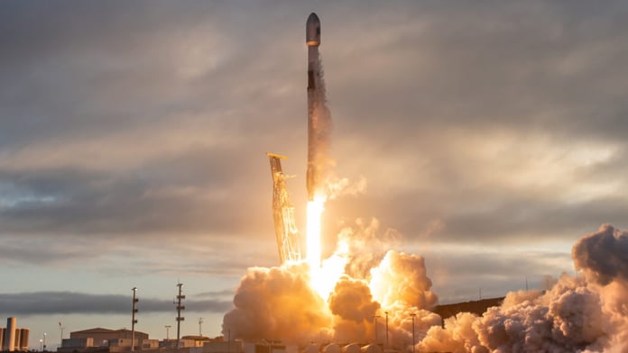 SpaceX Falcon 9 rocket launching from Vandenberg Space Force Base for a Space Force national security mission