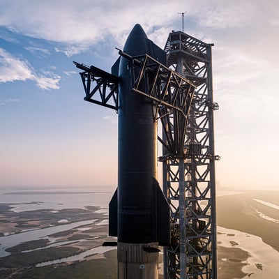 SpaceX Starship rocket on the launch pad at Boca Chica Texas with coastline in background