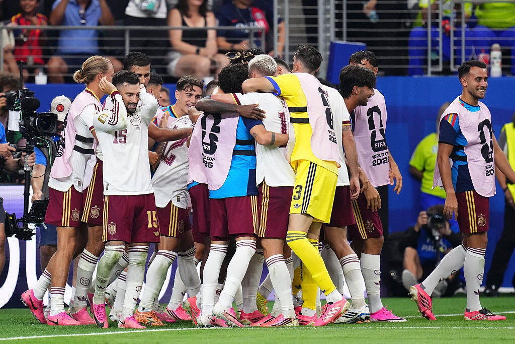 Pedro Porro of Spain celebrates with teammates after scoring the second goal against France in the 2026 World Cup semifinal