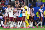 Pedro Porro of Spain celebrates with teammates after scoring the second goal against France in the 2026 World Cup semifinal