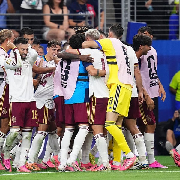 Pedro Porro of Spain celebrates with teammates after scoring the second goal against France in the 2026 World Cup semifinal
