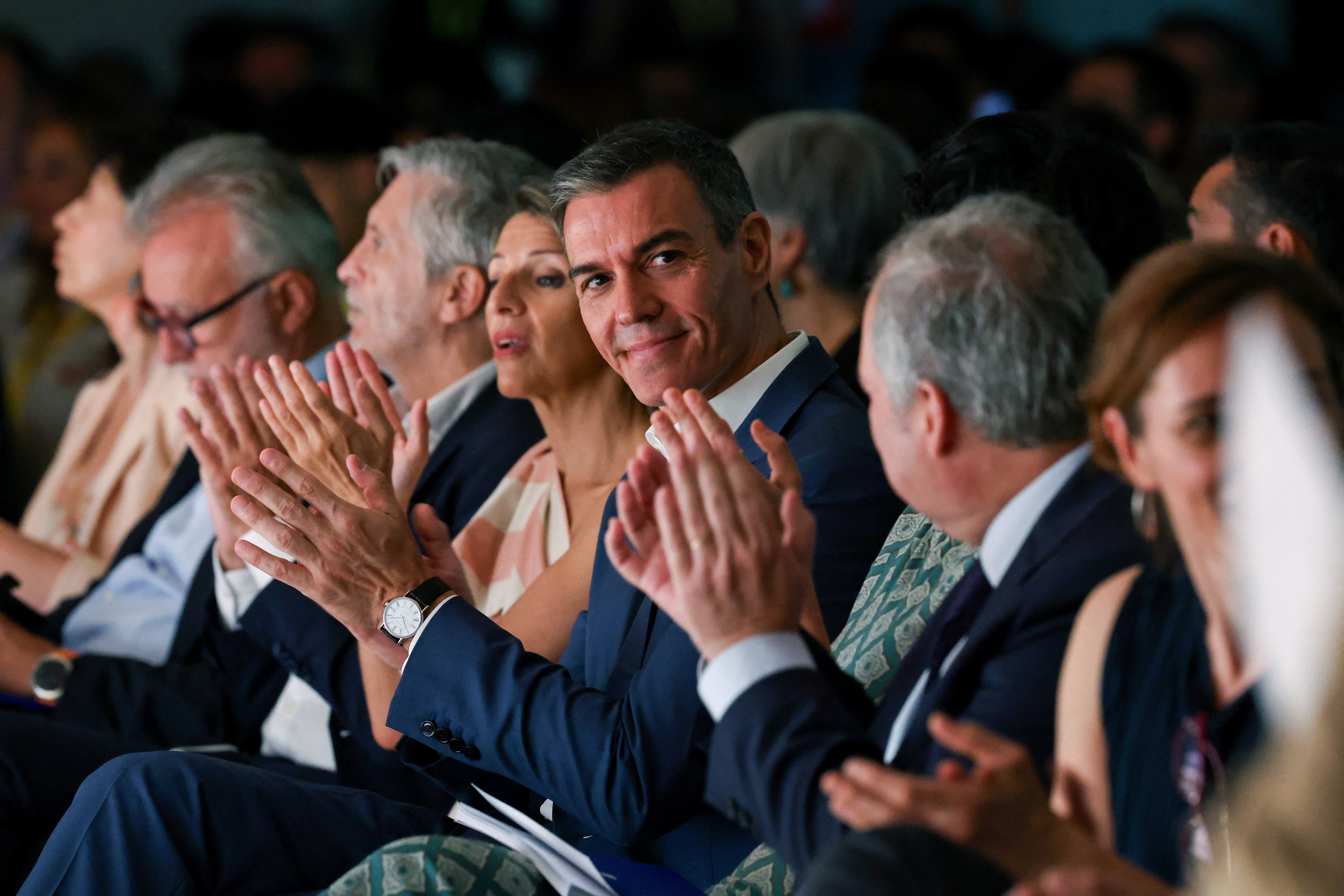 People waiting to submit applications at a Spanish immigration office during the 2026 regularization scheme