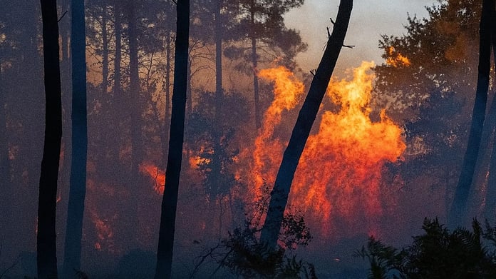 Smoke and flames rise from the Sierra Oeste wildfire near Madrid, Spain in July 2026