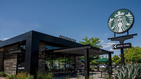 A Starbucks store location as the chain reports Q2 2026 earnings beats under CEO Brian Niccol