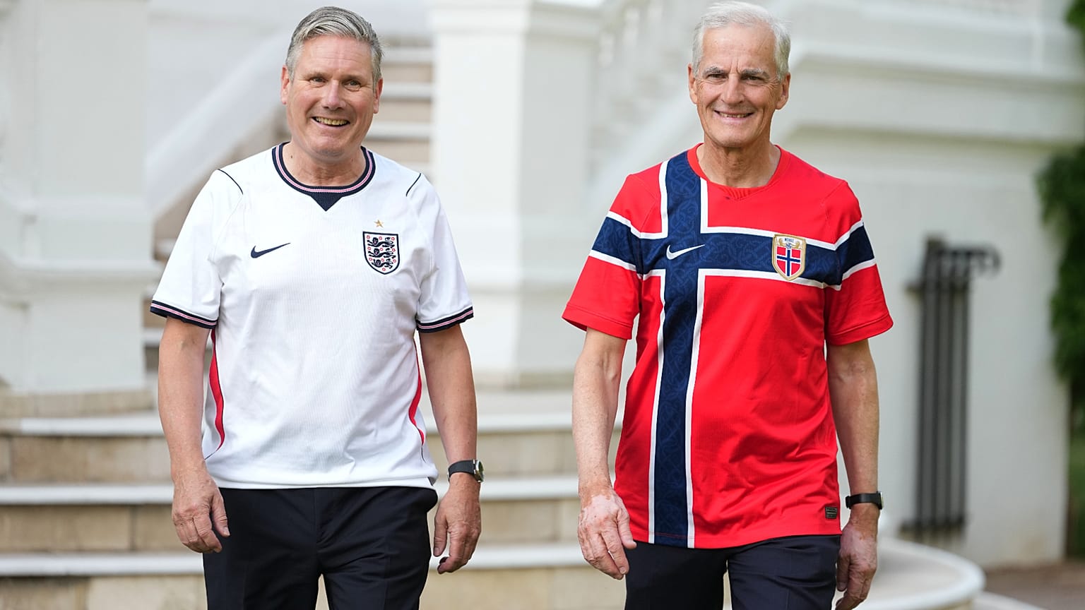 British PM Keir Starmer and Norwegian PM Jonas Gahr Store wearing their national team shirts ahead of the England vs Norway World Cup quarterfinal