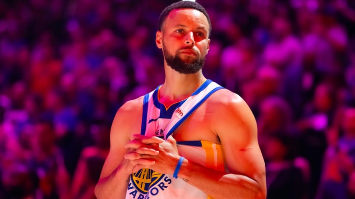 Stephen Curry looks on during a Golden State Warriors media event in 2026