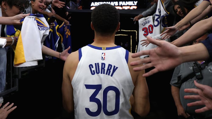 Stephen Curry dribbles during a Golden State Warriors NBA game in 2026