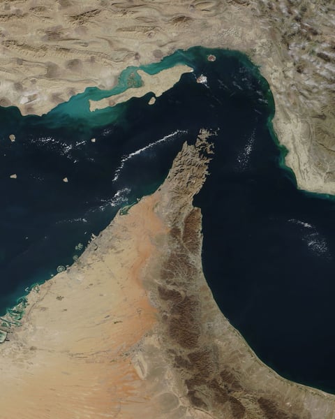 Satellite image of the Strait of Hormuz showing the narrow passage between Iran and Oman during the US-Iran conflict