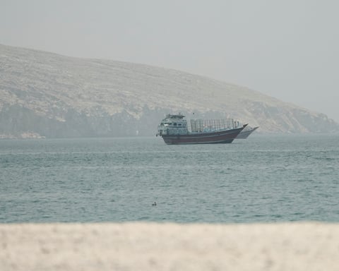 Ships navigating the Strait of Hormuz near Musandam, Oman
