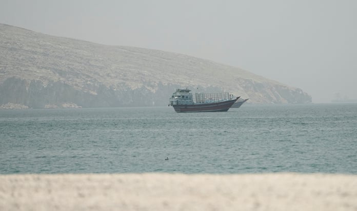 Ships navigating the Strait of Hormuz near Musandam, Oman