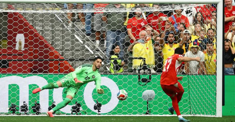 Switzerland players celebrate World Cup 2026 quarterfinal qualification after Colombia penalty shootout win