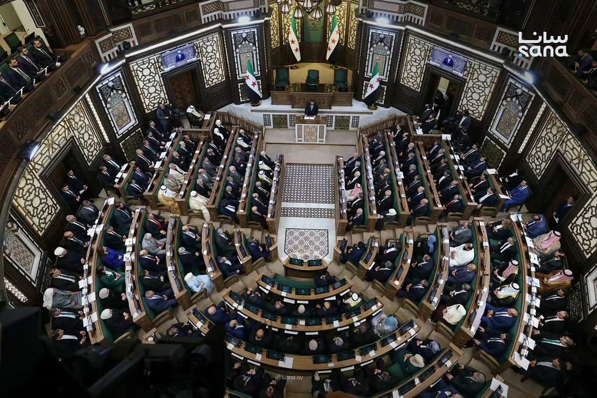 Members of Syria's new People's Assembly attend the inaugural session in Damascus on July 12, 2026
