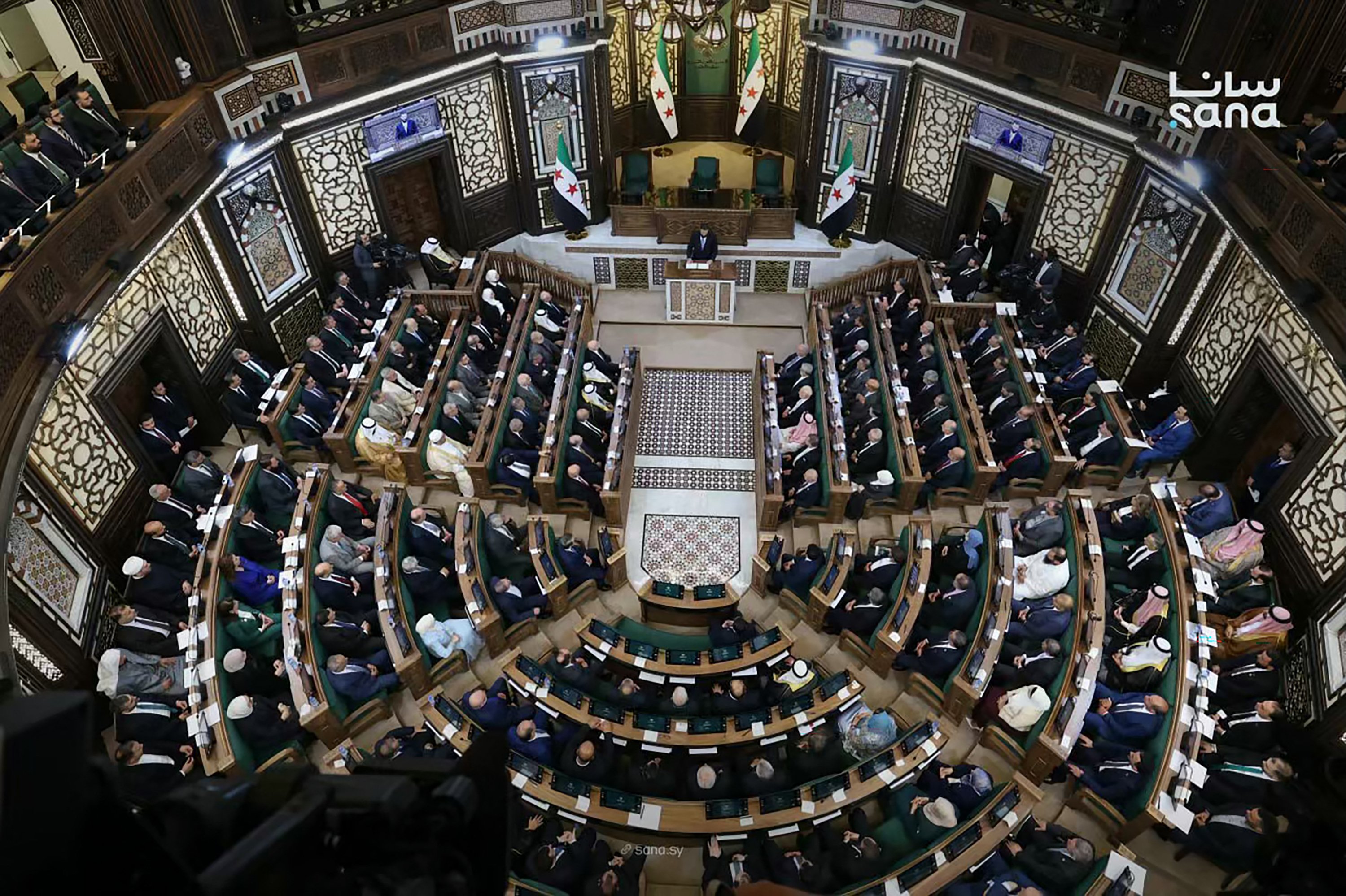 Members of Syria's new People's Assembly attend the inaugural session in Damascus on July 12, 2026