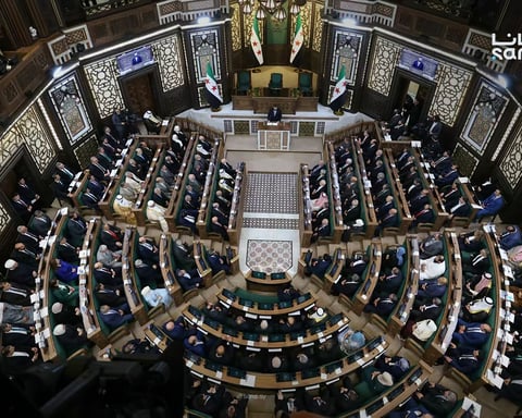 Members of Syria's new People's Assembly attend the inaugural session in Damascus on July 12, 2026