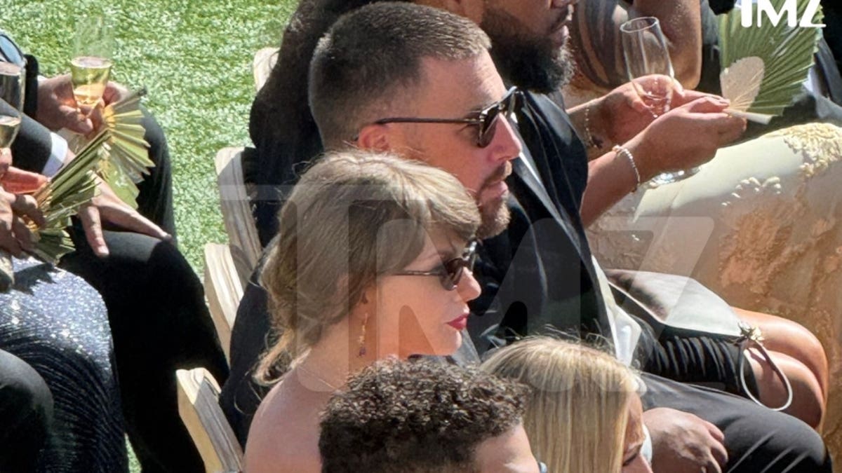 Taylor Swift and Travis Kelce at JuJu Smith-Schuster and Laura Kruk's wedding ceremony