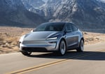 Tesla Model Y on a road, central to Tesla's record Q2 2026 delivery performance of 467,762 vehicles