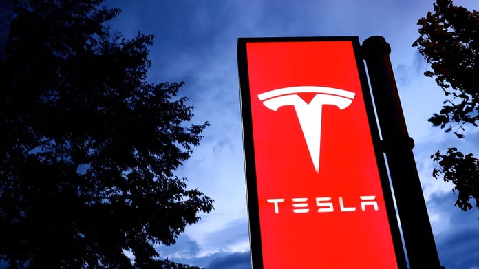 Tesla vehicles lined up at a delivery center as Q2 2026 hits record 480,126 deliveries