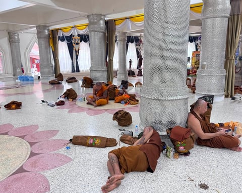 Buddhist monks resting at Phu Manorom temple in Mukdahan Thailand after truck crash during pilgrimage July 2 2026