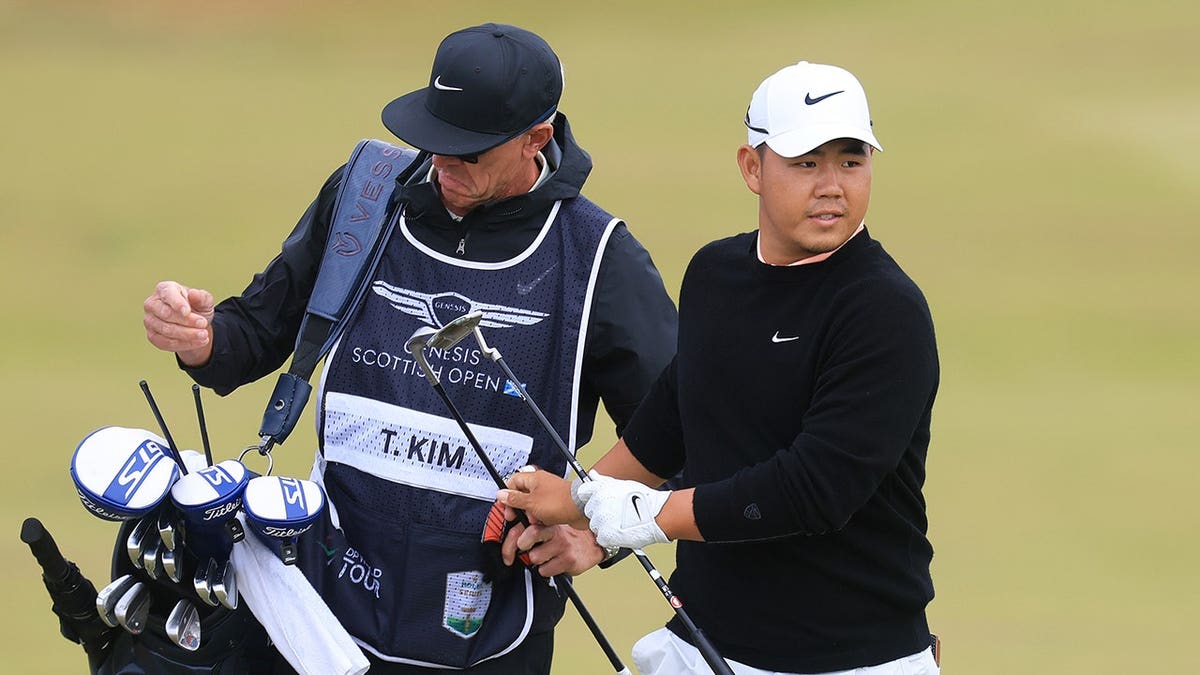 Tom Kim celebrates winning the Genesis Scottish Open at The Renaissance Club in North Berwick, Scotland