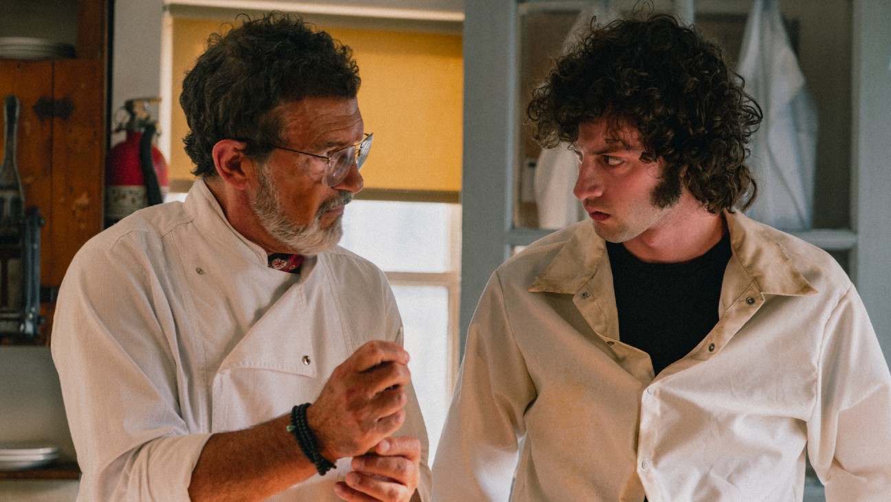 Antonio Banderas and Dominic Sessa in a kitchen scene from A24s Tony, the Anthony Bourdain biopic directed by Matt Johnson