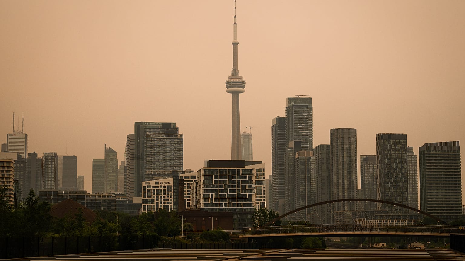 Toronto CN Tower obscured by wildfire smoke as Ontario fires produce world worst air quality
