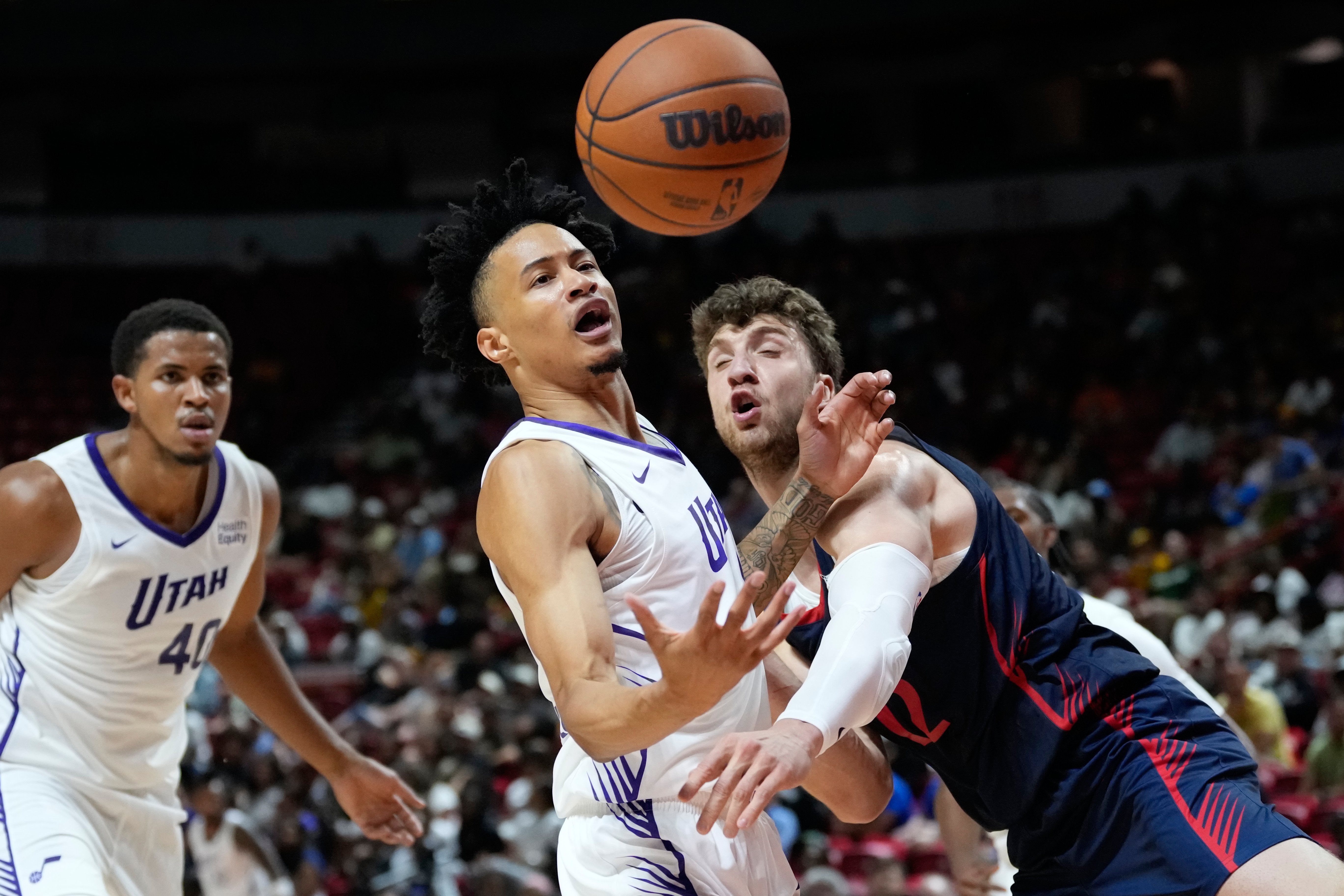 Trey Alexander of the Utah Jazz is stretchered off the court during NBA Summer League against the Chicago Bulls