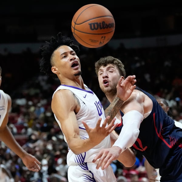 Trey Alexander of the Utah Jazz is stretchered off the court during NBA Summer League against the Chicago Bulls