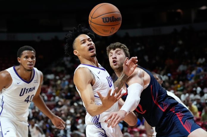 Trey Alexander of the Utah Jazz is stretchered off the court during NBA Summer League against the Chicago Bulls