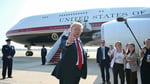 US President Donald Trump boarding Air Force One, the Boeing 747-8 aircraft offered by Qatar amid Gulf business ties