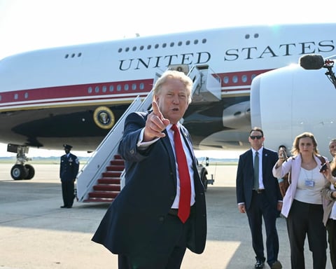 US President Donald Trump boarding Air Force One, the Boeing 747-8 aircraft offered by Qatar amid Gulf business ties