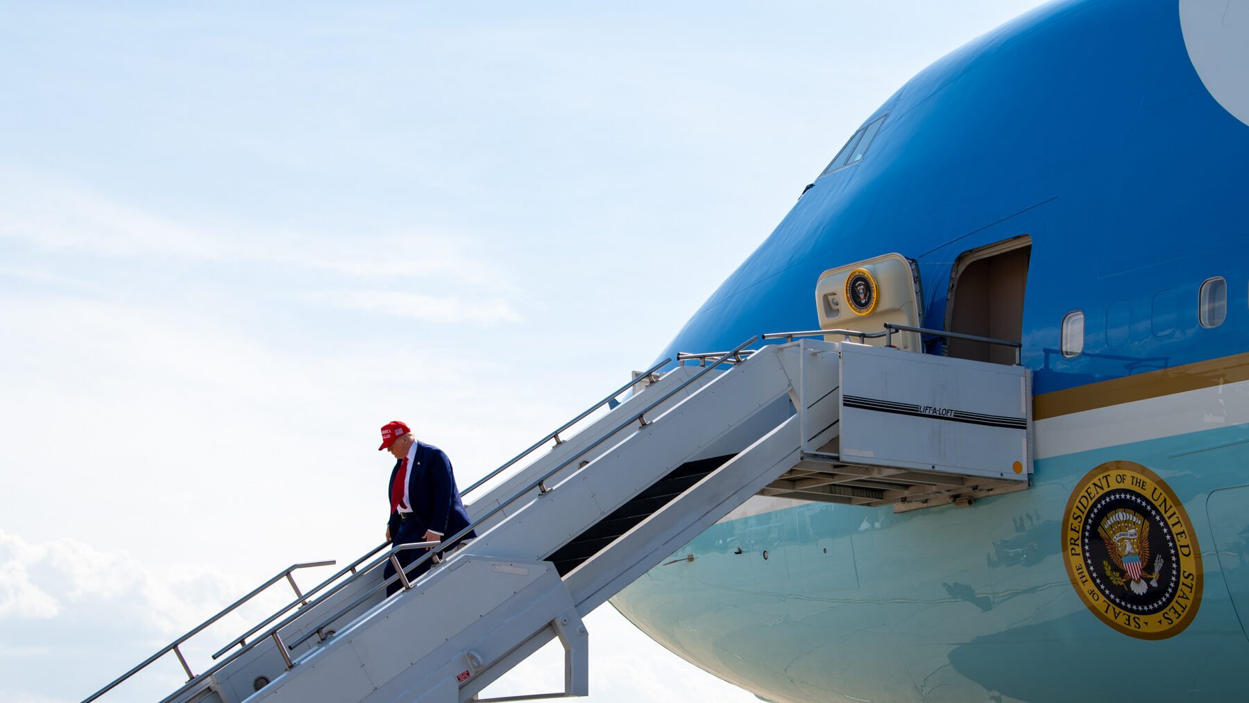 President Trump deplaning from the current Air Force One VC-25A aircraft