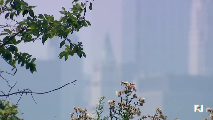 Hazy orange sky from wildfire smoke over US city from Canada wildfires July 2026