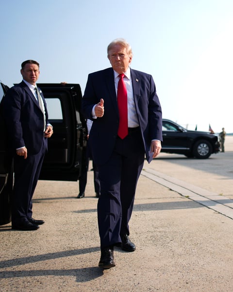 President Donald Trump speaks to reporters before boarding Air Force One at Joint Base Andrews