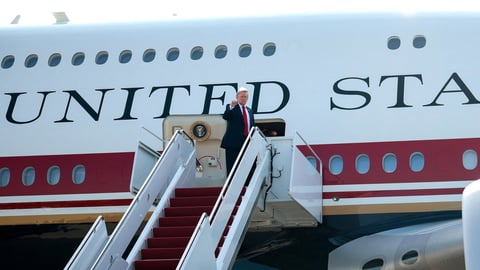 President Donald Trump boards the Qatar-gifted Boeing 747-8 Air Force One for its inaugural presidential flight in July 2026