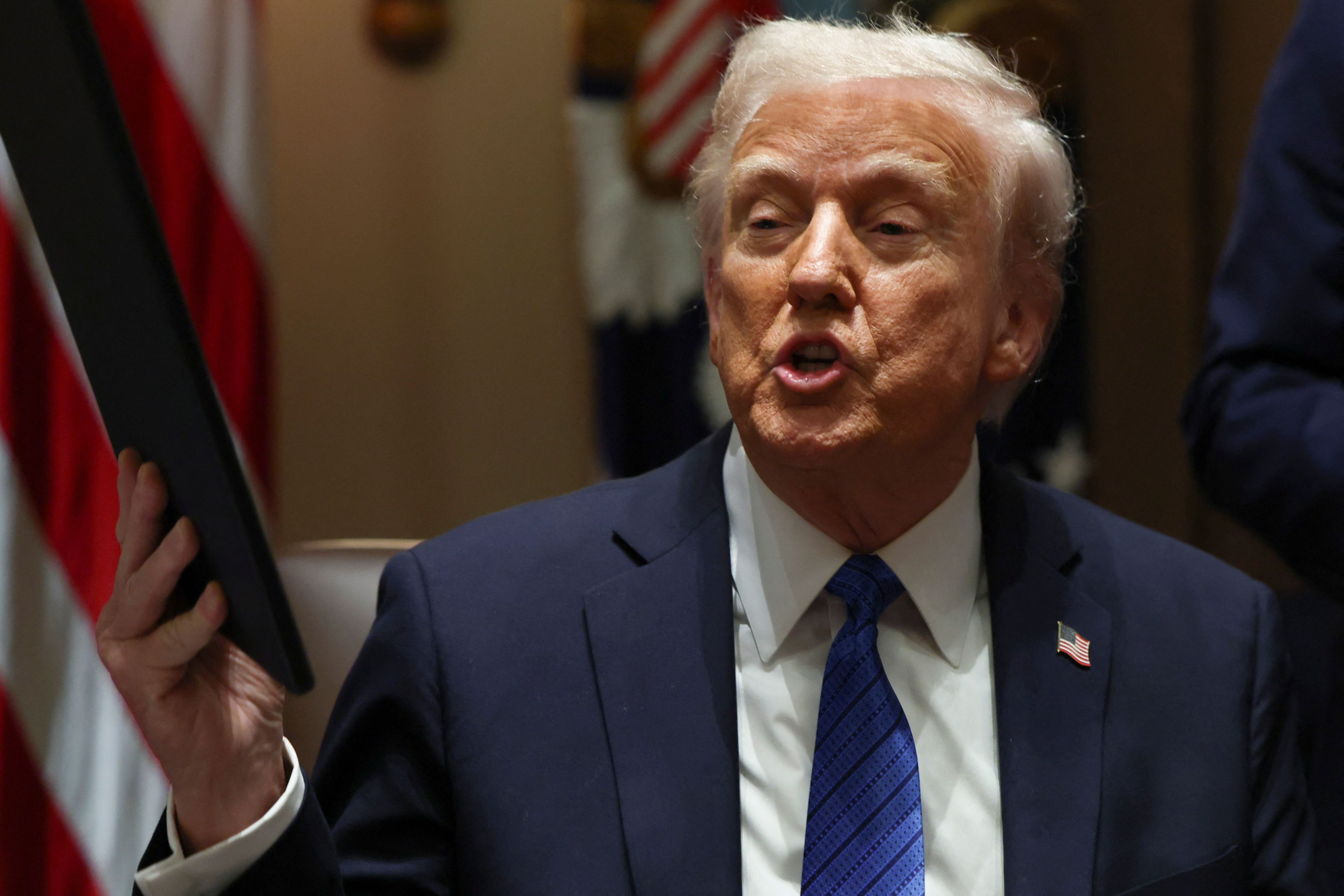 Donald Trump gestures during address as Senate Republicans debate SAVE America Act and August recess
