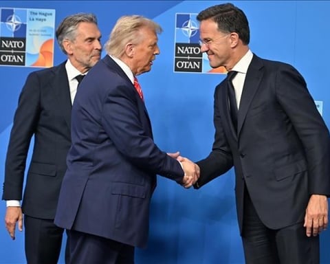 Donald Trump speaks at the NATO summit after directing Treasury Secretary Scott Bessent to halt US trade with Spain.