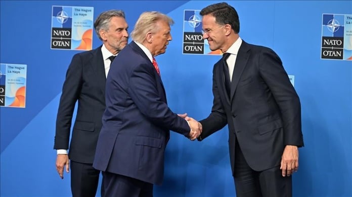 Donald Trump speaks at the NATO summit after directing Treasury Secretary Scott Bessent to halt US trade with Spain.