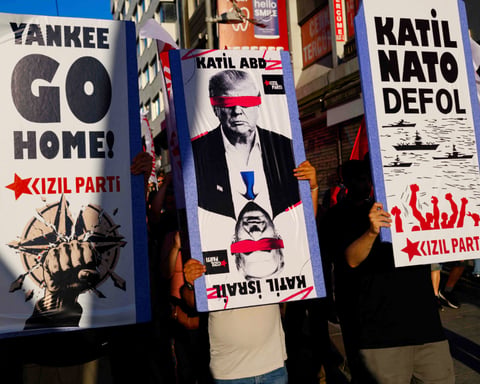 Protesters wave flags during anti-NATO demonstration in Istanbul ahead of Ankara summit July 2026