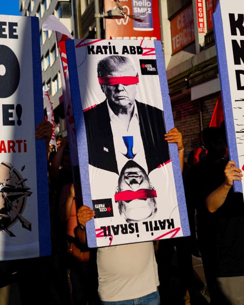 Protesters wave flags during anti-NATO demonstration in Istanbul ahead of Ankara summit July 2026