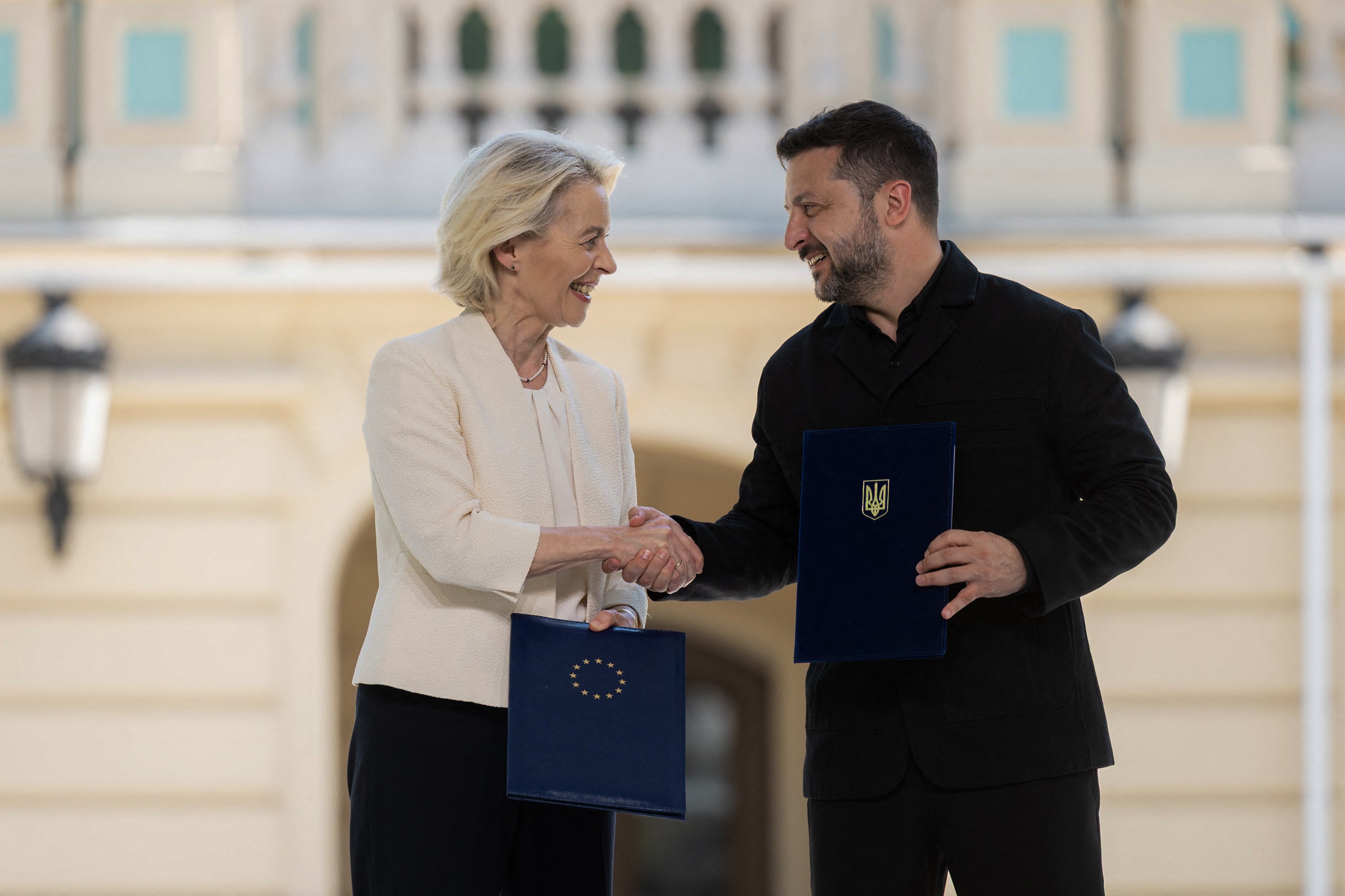 Ukraine President Zelenskyy and EU Commission President von der Leyen sign bilateral documents in Kyiv July 15 2026