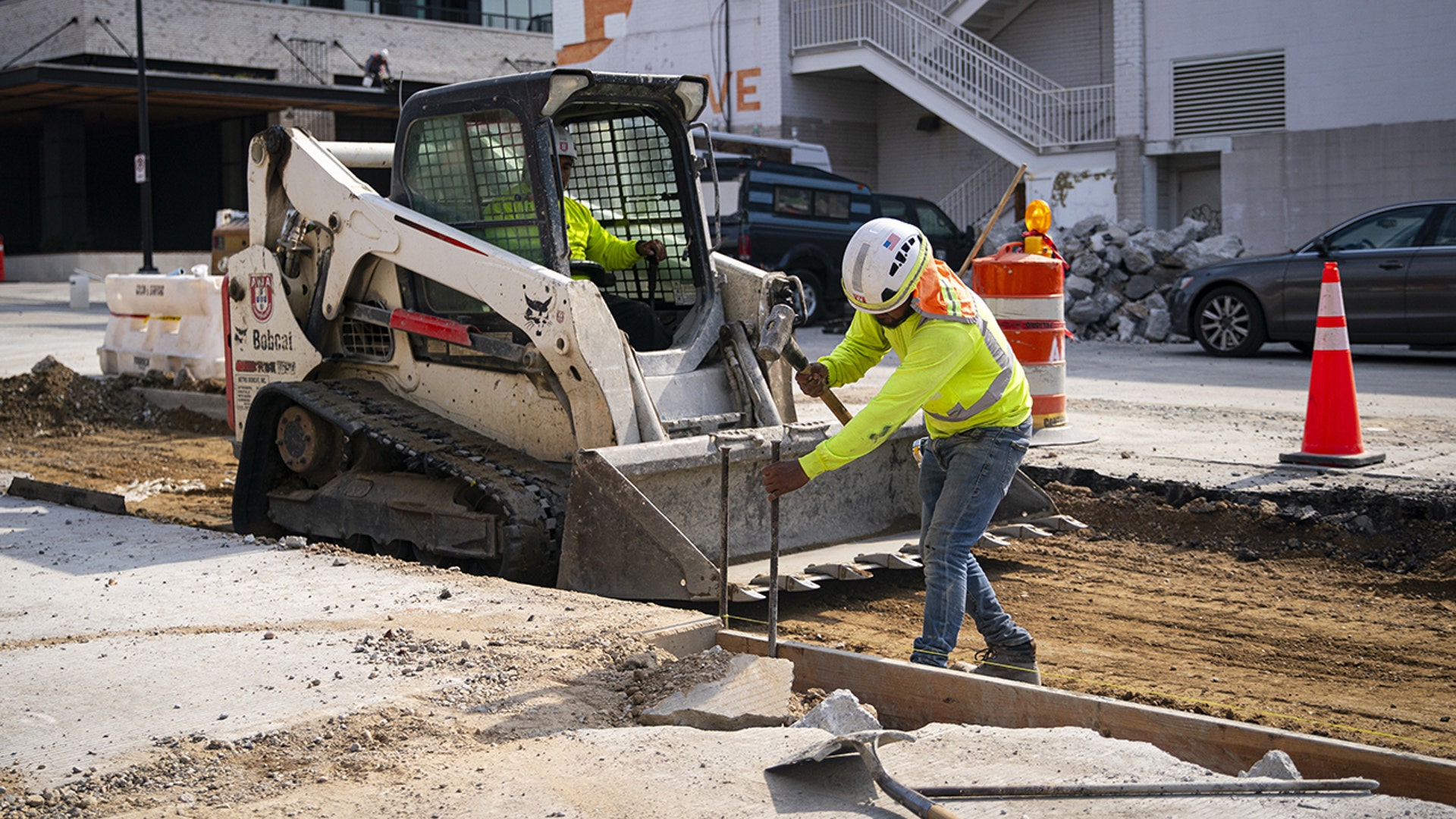 US construction workers representing the labor market as June 2026 payrolls fall to 57,000