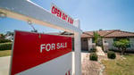 For sale sign in front of a home in California as US median home prices hit all-time high of $440600