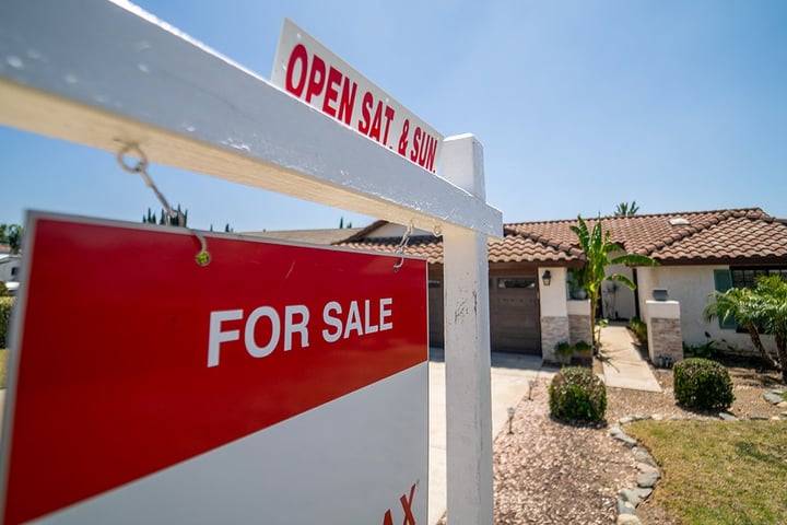 For sale sign in front of a home in California as US median home prices hit all-time high of $440600